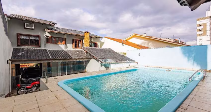Casa de 4 dormitórios e 208m² à venda no bairro jardim botânico, porto alegre.