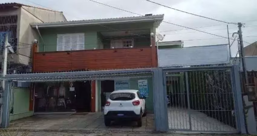 Casa com 4 quartos à venda na Travessa Escobar, --, Camaquã, Porto Alegre