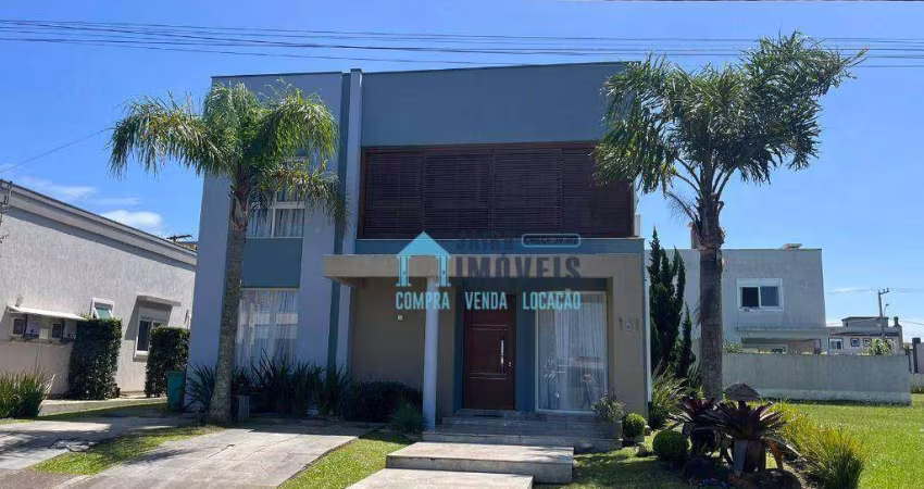 Sobrado com 5 dormitórios à venda, 272 m² por R$ 2.195.000 - Condomínio Marítimo - Tramandaí/RS