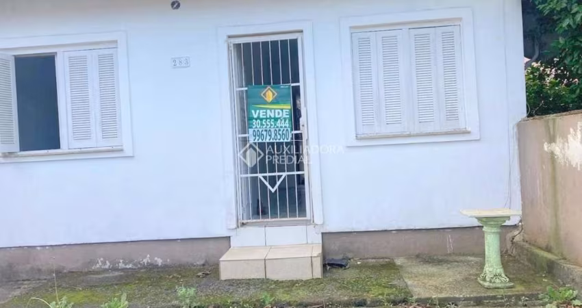 Casa com 2 quartos à venda na Rua Irerês, 283, Jardim Algarve, Alvorada