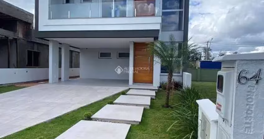 Casa em condomínio fechado com 3 quartos à venda na Avenida AlphaVille, 2745, São Vicente, Gravataí