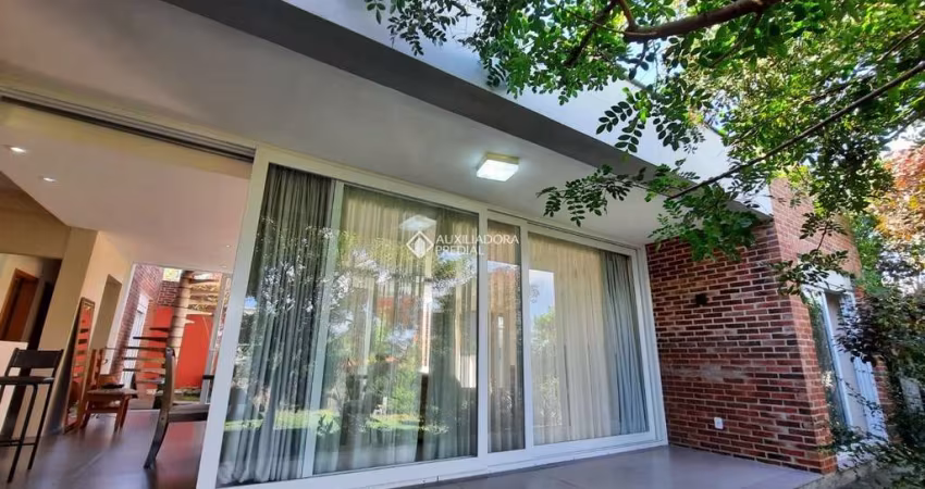 Casa em condomínio fechado com 2 quartos à venda na Rua Capororoca, 357, São Lucas, Viamão
