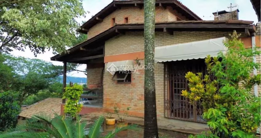 Casa com 4 quartos à venda na Rua Pedro de Oliveira França, 80, Hípica, Porto Alegre