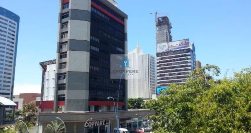 Sala comercial na Tancredo Neves com 100 m2, dividida em 6 ambientes, 2 banheiros e 1 vaga de garagem
