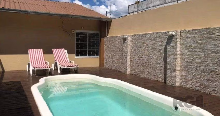 Casa com 3 dormitórios no bairro Rubem Berta
