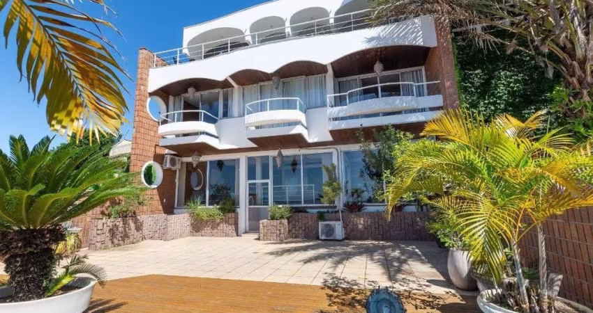 Casa 4 dormitórios à venda Vila Assunção Porto Alegre/RS