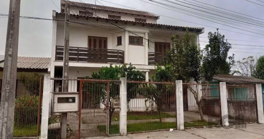Casa de alvenaria, 5 dormitórios em Alvorada.