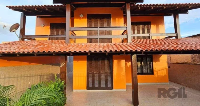 Casa 4 dormitórios à venda Igra Norte Torres/RS
