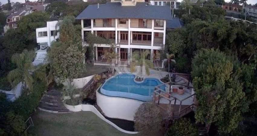 Casa com 4 dormitórios à venda, 1107 m² por R$ 3.700.000,00 - Vila Assunção - Po