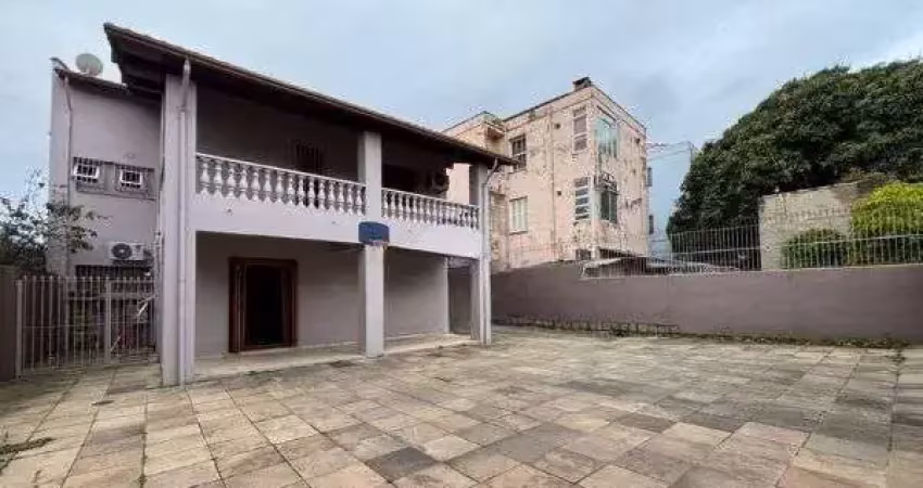 Casa com 4 quartos à venda na Rua Fonseca Ramos, 127, Medianeira, Porto Alegre