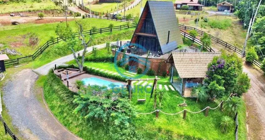 Chácara em meio a natureza com lindo chalé, piscina e terreno de 2.500m² à venda em canelinha/sc