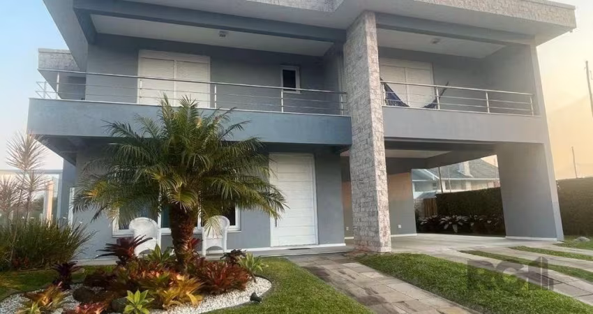 Casa em condomínio fechado com 5 quartos à venda na Rua Rio Novo, 2083, Atlântida, Xangri-Lá