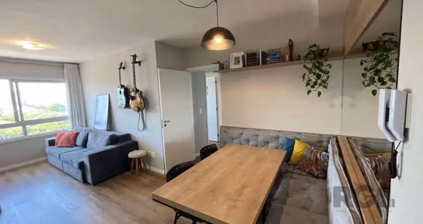 Apartamento 2 quartos, suíte e 2 vagas de garagem na cidade baixa.