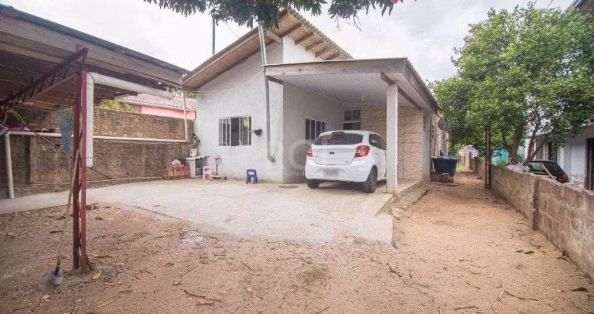 Casa com 3 dormitórios, 2 suítes, amplo pátio e 2 vagas de garagem na Zona Norte