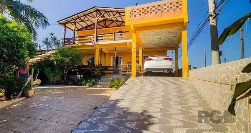 casa de 4 dormitórios, no bairro Lomba do Pinheiro