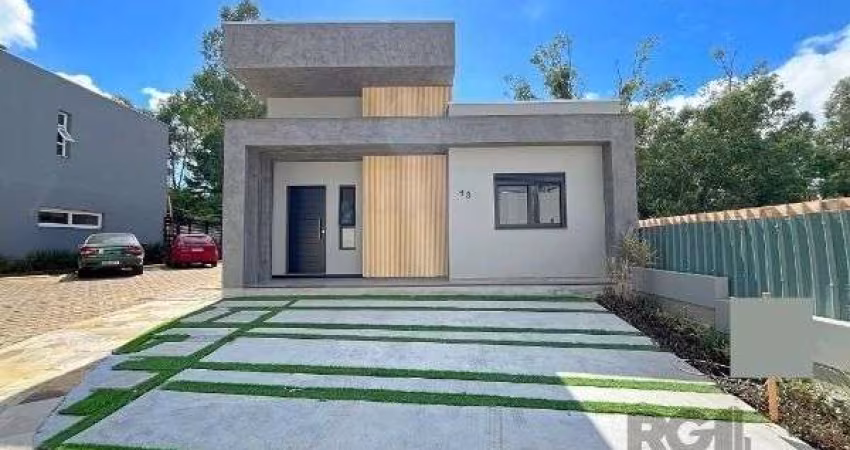 Casa em Porto Alegre, no bairro Hípica, com 3 dormitório(s), e 3 banheiros, à venda.