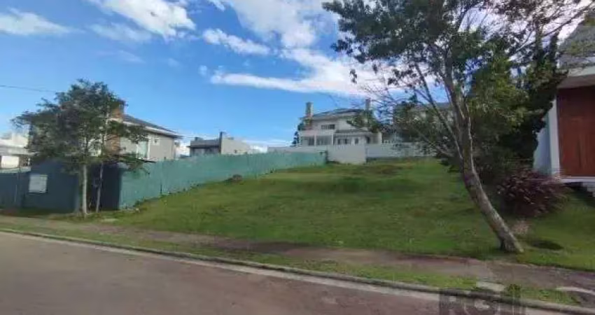 Terreno em condominio em porto alegre, no bairro vila nova, à venda.