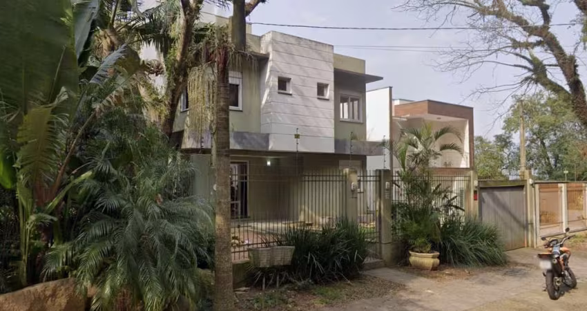 Casa 367m², 3 dormitórios, 4 vagas no bairro Ipanema