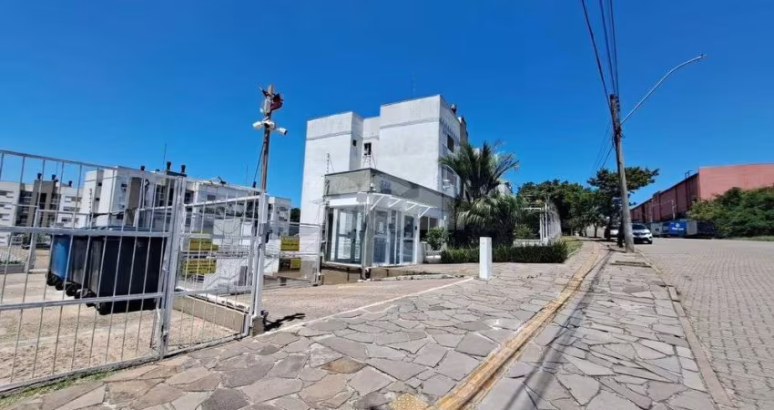 Apartamento com sacada e churrasqueira