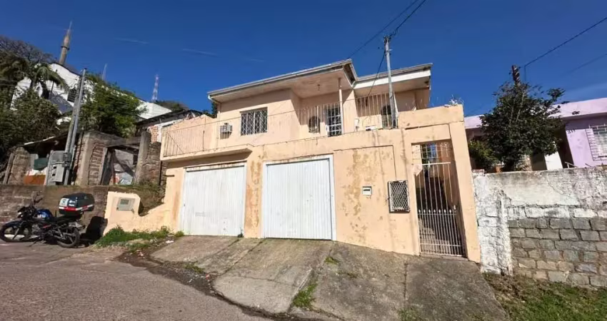 Casa com 4 dormitórios, suíte, piscina, churrasqueira e 2 vagas cobertas à venda