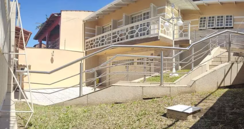Casa com 4 dormitórios, sendo 1 suíte, garagem para dois carros fechada, no bairro santa isabel em viamão