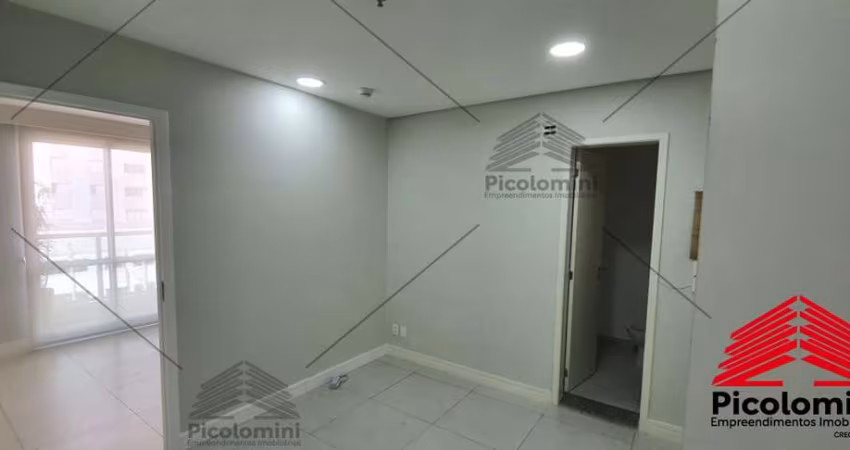 Sala comercial a venda de 38m², varanda,  ar condicionado, 2 banheiros, uma sala de espera, 2 vagas de garagem coberta