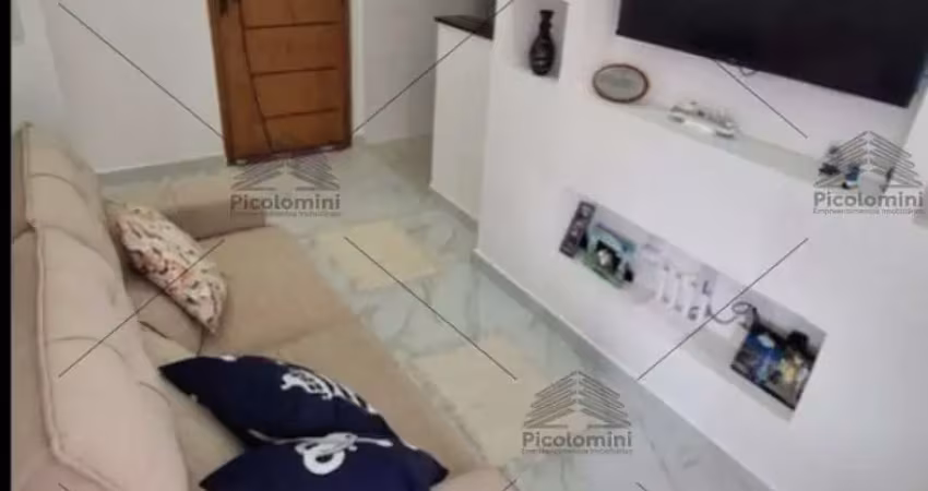 Apartamento a venda na praia grande de 43m², 1 quarto, 1 banheiro, varanda, cozinha planejada, ar condicionado, 1 vaga de garagem