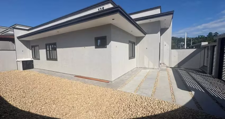 Casa com 3 dormitórios sendo 1 suíte em ótima localização em itajuba, barra velha-sc