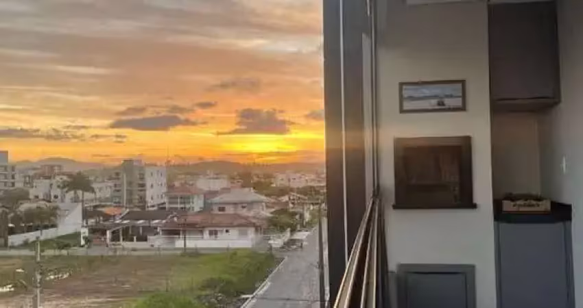 Apartamento 3 dormitórios e 2 vagas, mobiliado com vista mar