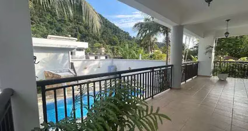 Casa com 6 dormitórios à venda, 400 m² por R$ 3.000.000,00 - Guaiuba - Guarujá/SP