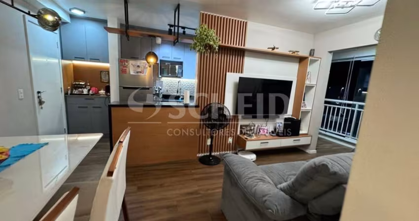Apartamento de dois quartos uma suite e uma vaga de garagem