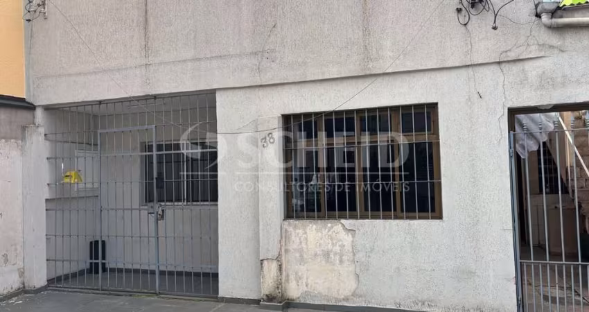 Excelente casa térrea com 5 salas, 2 banheiros, cozinha,  4 vagas ótima localização