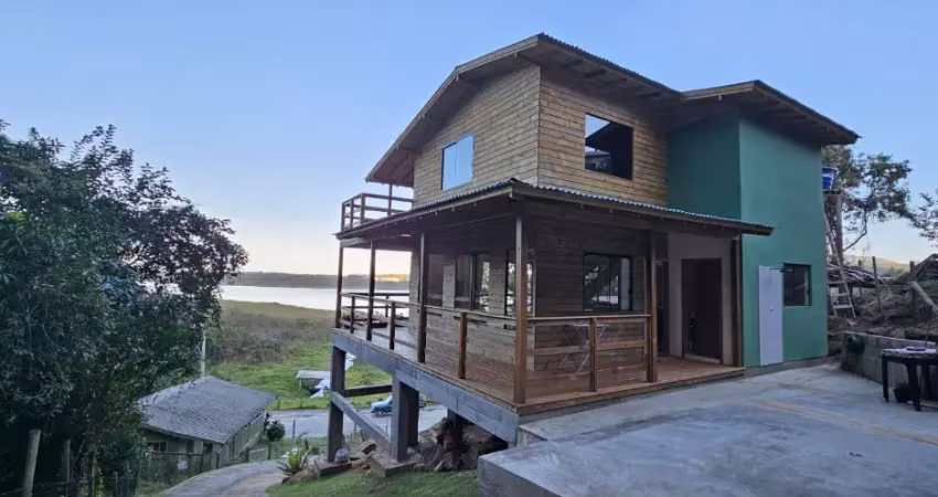Casa com vista para lagoa na costa do macacu  próximo da cachoeira  garopaba sc