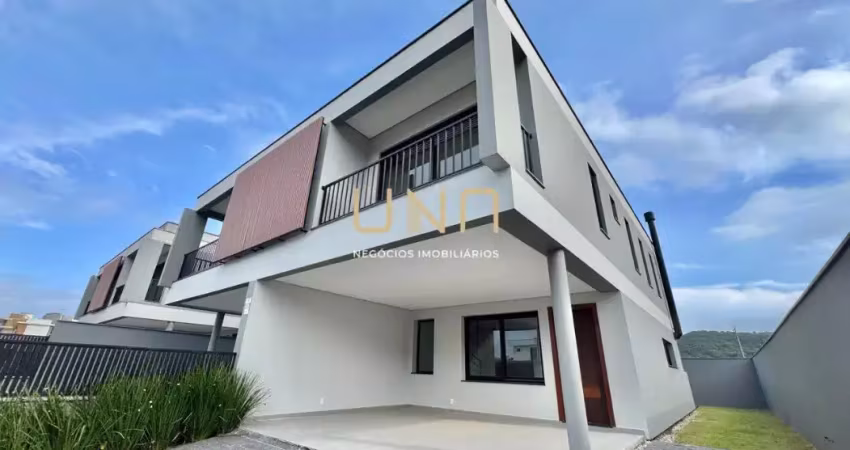 Excelente casa moderna geminada de 03 suítes, com vaga de garagem e quintal privativo.