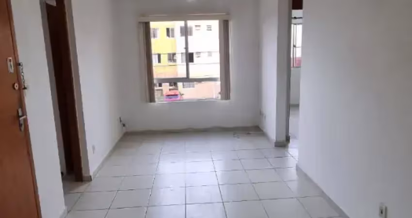 Vendo lindo apartamento com tres quartos segundo andar  com garagem em frente ao bloco