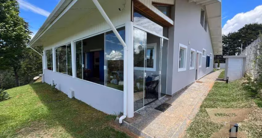 Casa com 5 dormitórios à venda, 315 m² por r$ 1.900.000,00 - vila natal - campos do jordão/sp