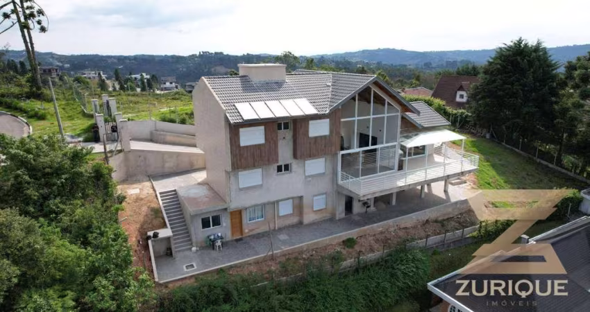 Casa com 4 dormitórios à venda, 330 m² por R$ 3.000.000,00 - Alto Do Capivari - Campos do Jordão/SP