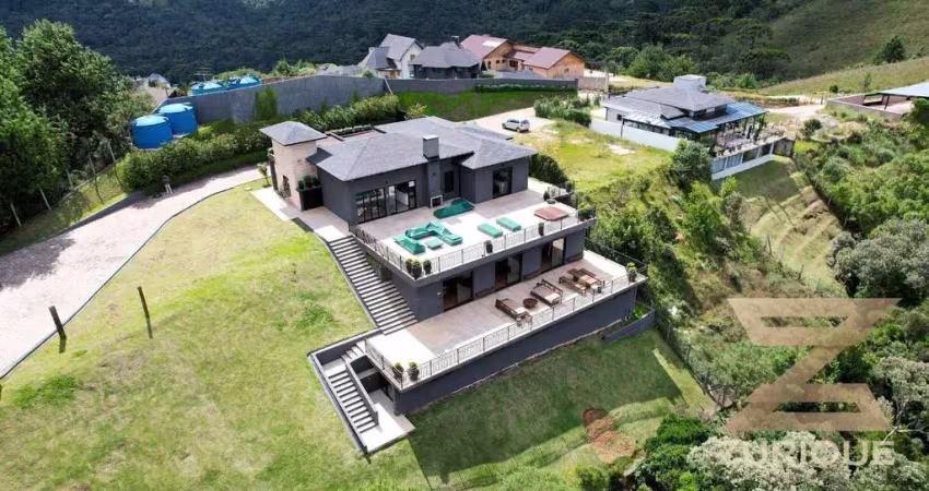 Casa com 5 dormitórios à venda, 448 m² por r$ 6.900.000,00 - vila medica - campos do jordão/sp