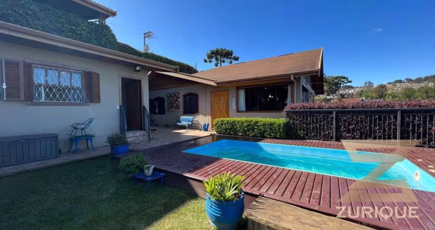 Casa com 4 dormitórios à venda, 244 m² por R$ 1.100.000,00 - Vila Telma - Campos do Jordão/SP