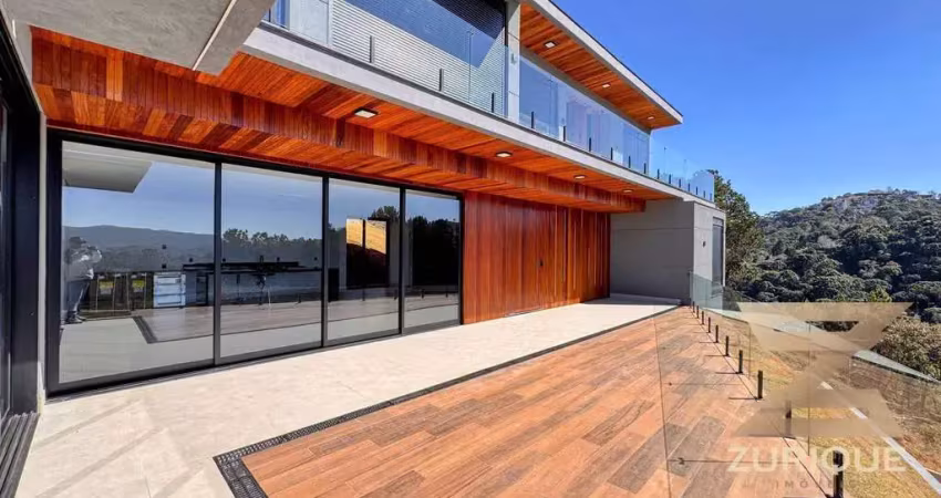 Casa com 4 dormitórios à venda, 450 m² por r$ 7.900.000,00 - condomínio iporanga - campos do jordão/sp