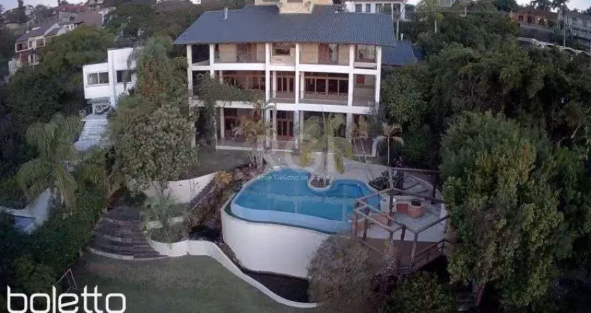 Casa com 4 dormitórios à venda, 1107 m² por R$ 3.700.000,00 - Vila Assunção - Po