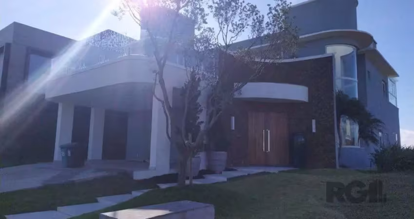 Linda casa para comprar , mobiliada ,com 3 suítes no condomínio ponta da figueir