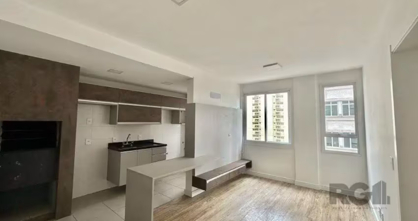 Apartamento para alugar no Bairro Menino Deus com 1 dormitório semi-mobiliado.