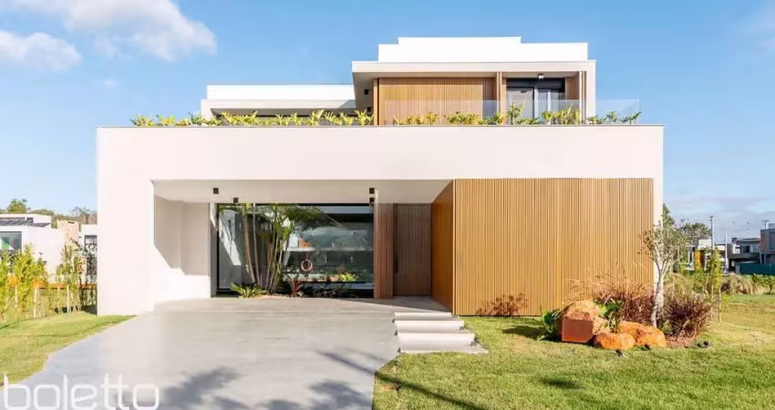 Linda casa para comprar com 4 suites em condomínio top