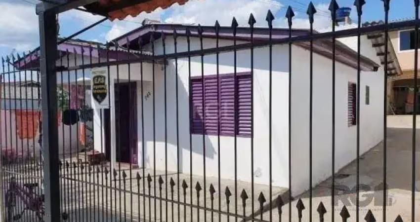Vende terreno 300m², com 3 casas, casa da frente 2 dormitórios, sobrado nos fund