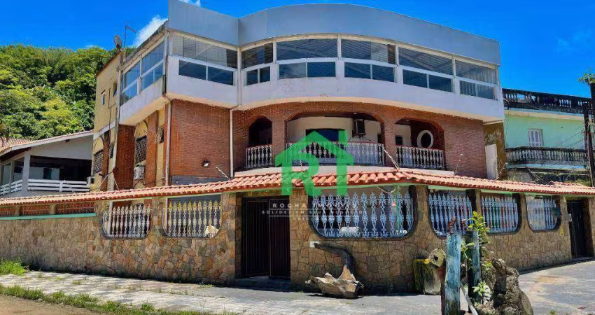 Casa á venda na Praia do Guaiuba | Rocha Imóveis Guarujá