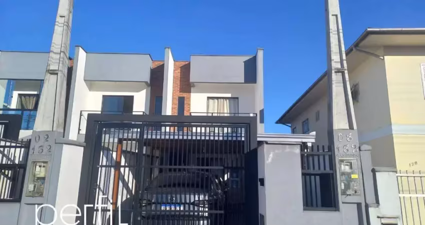 Casa à venda em joinville-sc, bairro costa e silva: 2 quartos, 2 suítes, 1 sala, 3 banheiros, 2 vagas de garagem, 88,24m².