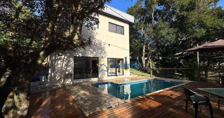 Casa em condomínio fechado à venda em atibaia com piscina e bosque