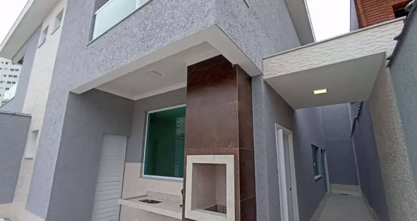 Sobrado com 3 dormitórios à venda, 135 m² por R$ 990.000,00 - Tupi - Praia Grande/SP