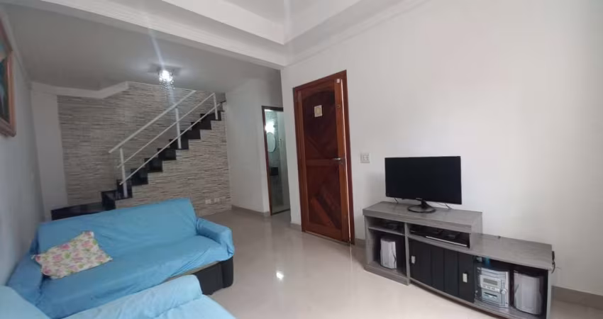 Sobrado com 3 dormitórios à venda, 113 m² por R$ 660.000,00 - Vila Guilhermina - Praia Grande/SP